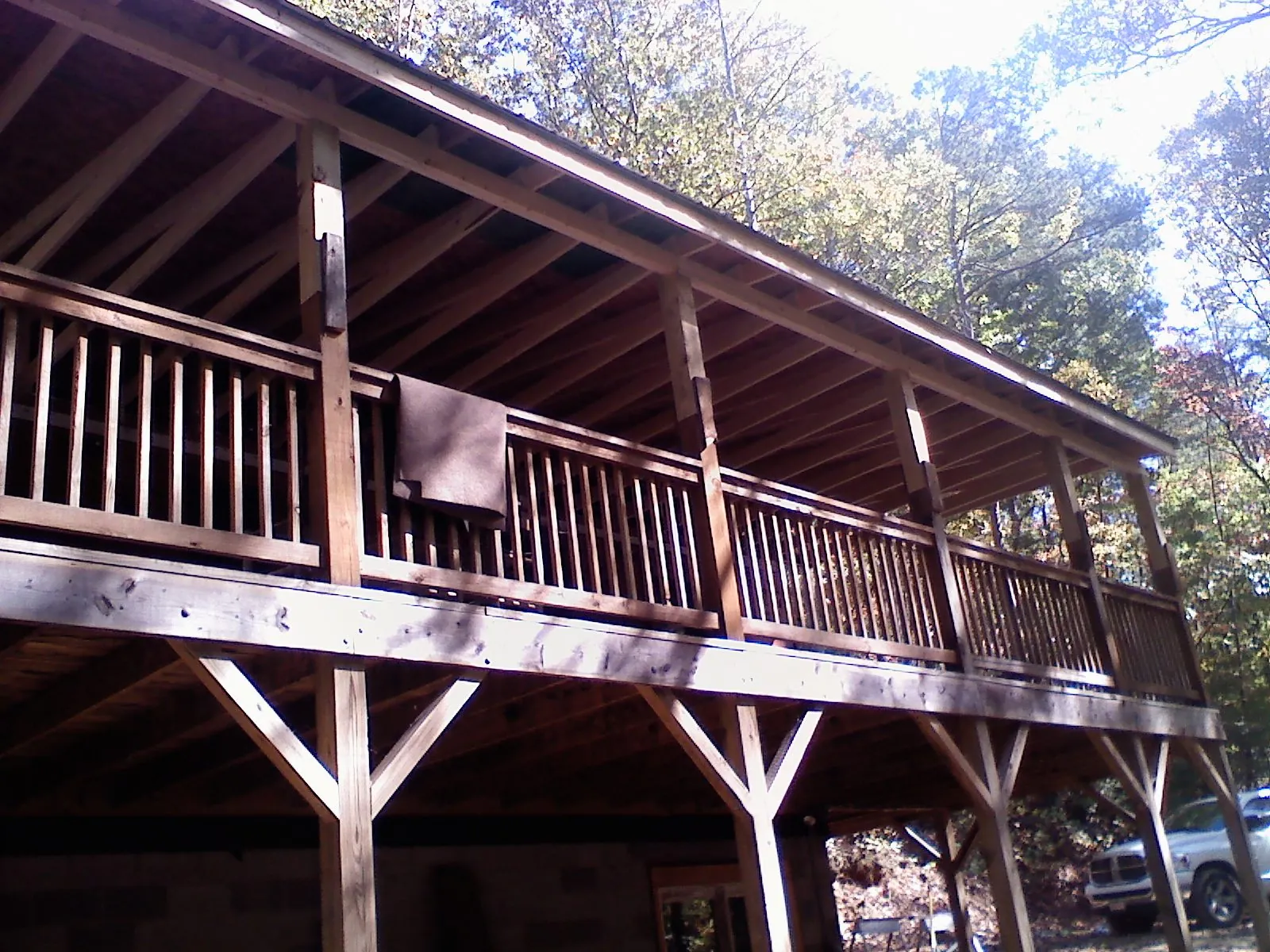 Timber framing under a new elevated porch and deck — Roof Leak Repair in Carbon by Roofing Brothers